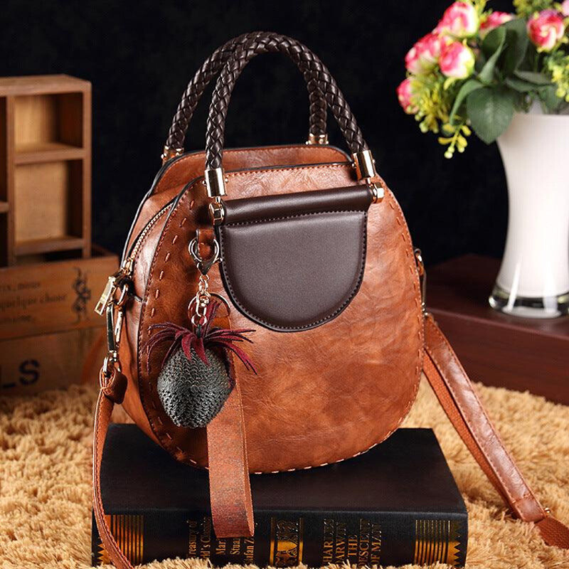 Clara | Bolso Redondo Vintage Detalles Trenzados Elegancia