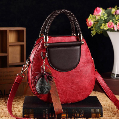 Clara | Bolso Redondo Vintage Detalles Trenzados Elegancia