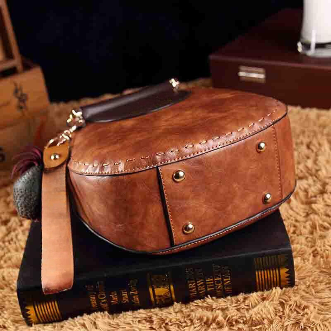 Clara | Bolso Redondo Vintage Detalles Trenzados Elegancia