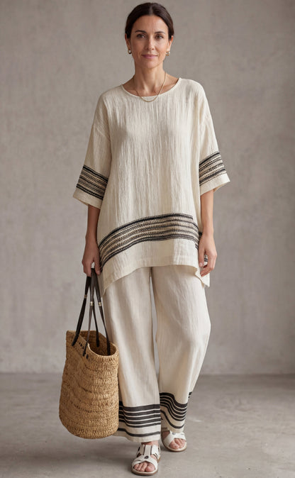 Mariella — Top elegante de lino con rayas negras y pantalones fluidos