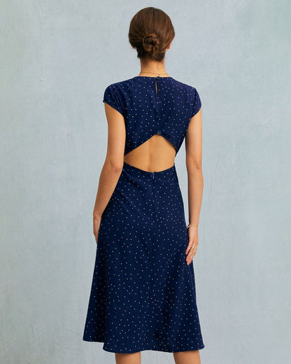 El Vestido Midi con Corte y Lunares de Cuello Redondo en Color Marino