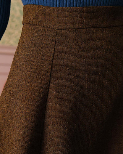 La Falda de Tweed Alta y Sólida