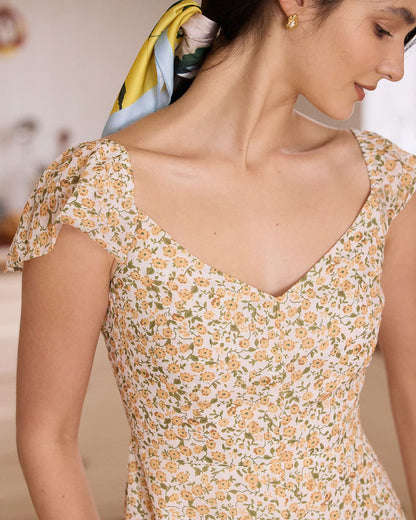 El Vestido Midi Floral Amarillo con Escote en V