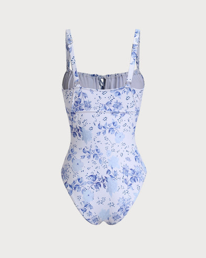 Traje de baño de una pieza con fruncidos florales blancos