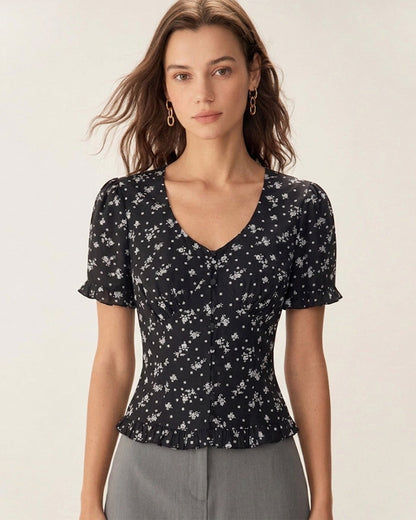 Blusa Negra con Estampado Floral de Cuello Redondo