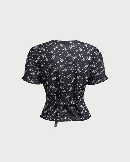 Blusa Negra con Estampado Floral de Cuello Redondo