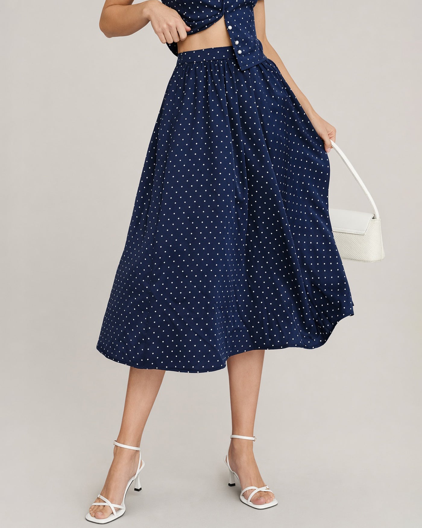 Falda Midi de Lunares Azules con Bolsillos