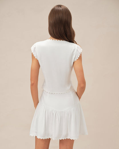 Falda Mini Arrugada con Botón Blanca