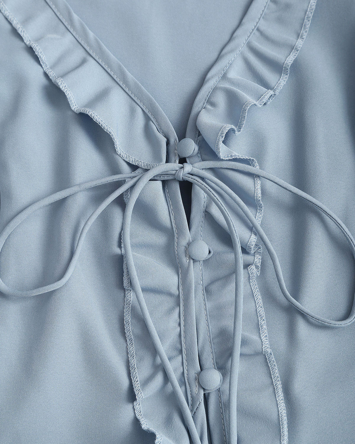 Blusa Azul con Volantes y Botones en V